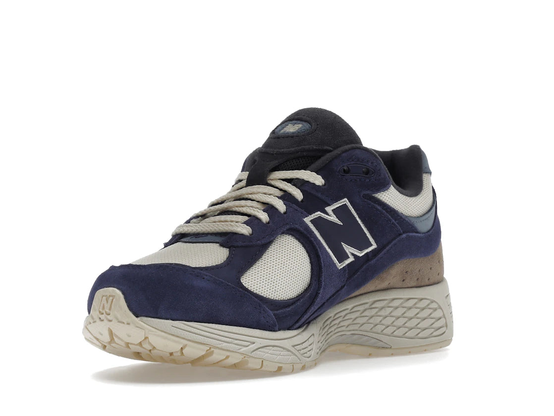 New Balance 2002R Light Cream Purple